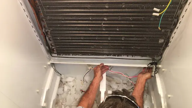 Built-in freezer with the evaporator cover removed for service