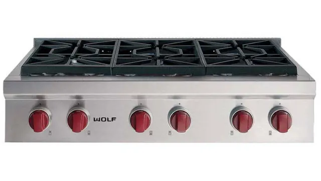 Six-burner sealed gas rangetop with red control knobs